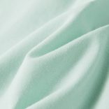 Világosmenta színű buggyos ujjú gyerekpóló 140