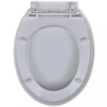 fehér ovális WC-ülőke lassan csukódó fedéllel