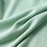 Sötétmenta színű hosszú ujjú gyerekpóló félgarbós nyakkal 128