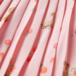 Világos narancssárga redős gyerekszoknya 128