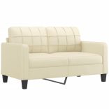 2 részes krémszínű műbőr ülőgarnitúra párnákkal