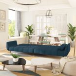 kétszemélyes kék bársony kanapéágy két párnával