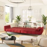 kétszemélyes bordó bársony kanapéágy két párnával