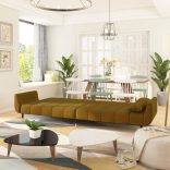 kétszemélyes barna bársony kanapéágy 2 párnával