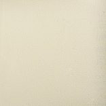 krémszínű műbőr dívány