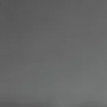 szürke dönthető műbőr fotel lábzsámollyal