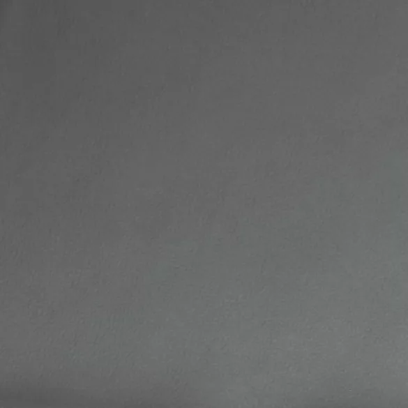 szürke dönthető műbőr fotel lábzsámollyal