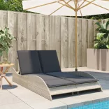 világosszürke polyrattan napozóágy párnákkal 114x205x73 cm