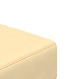 kétszemélyes krémszínű bársony kanapéágy két párnával