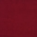 kétszemélyes bordó bársony kanapéágy két párnával