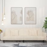 kétszemélyes krémszínű bársony kanapéágy két párnával