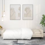 kétszemélyes krémszínű bársony kanapéágy két párnával