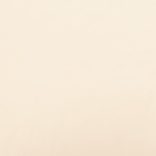 kétszemélyes krémszínű bársony kanapéágy két párnával