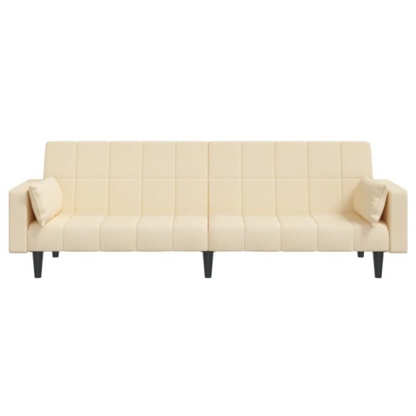 kétszemélyes krémszínű szövet kanapéágy két párnával