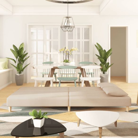 kétszemélyes krémszínű szövet kanapéágy két párnával