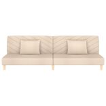 kétszemélyes krémszínű szövet kanapéágy két párnával